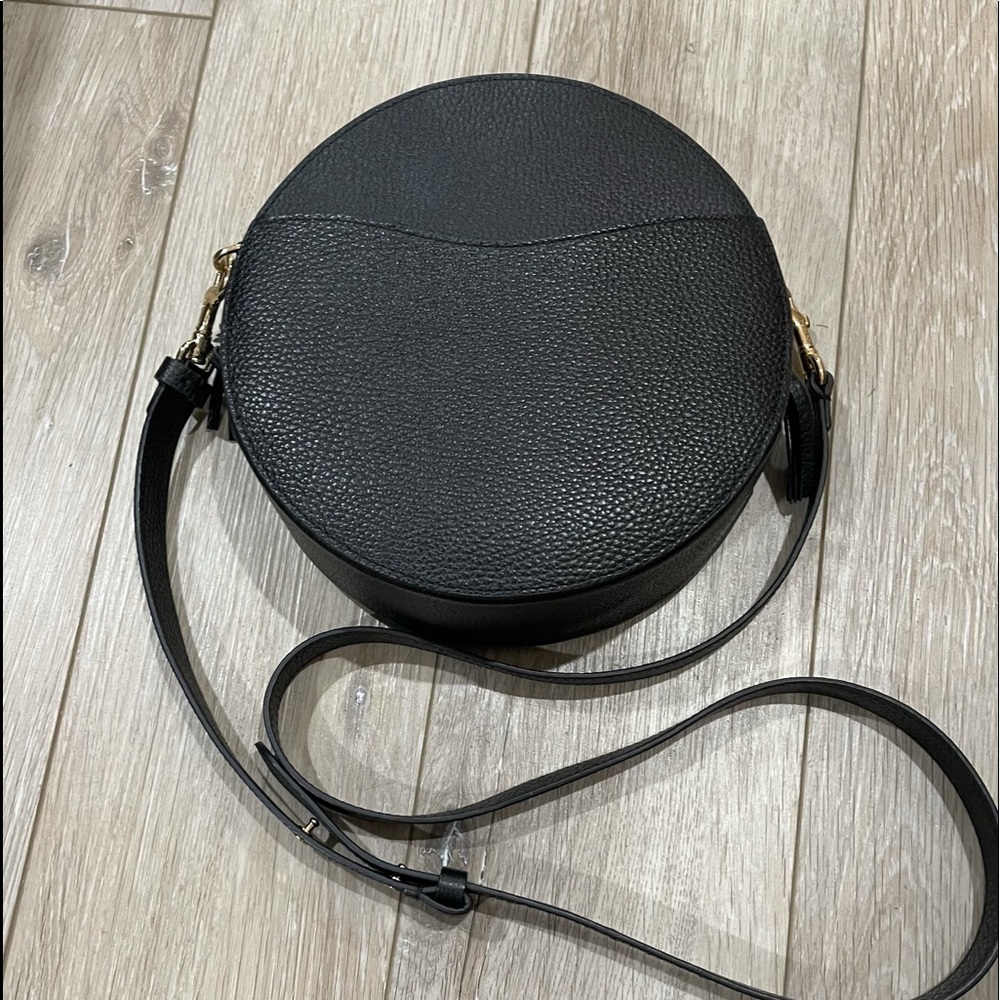 Cuyana black leather round bag.Great condition. Can be worn as crossbody.Used 3x